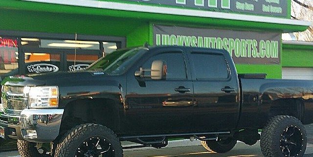 Chevy 2500 Lifted Truck with Wheels